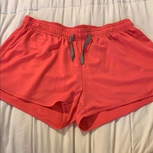 Pink running shorts
